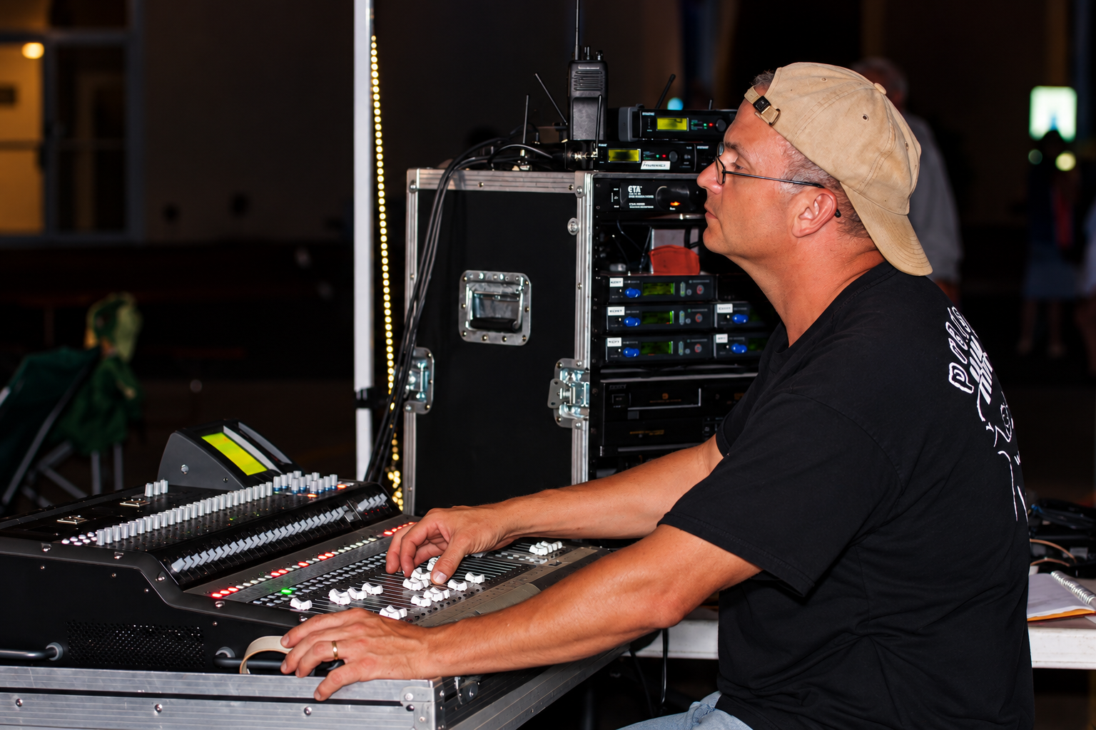 Tom Lines working at a soundboard